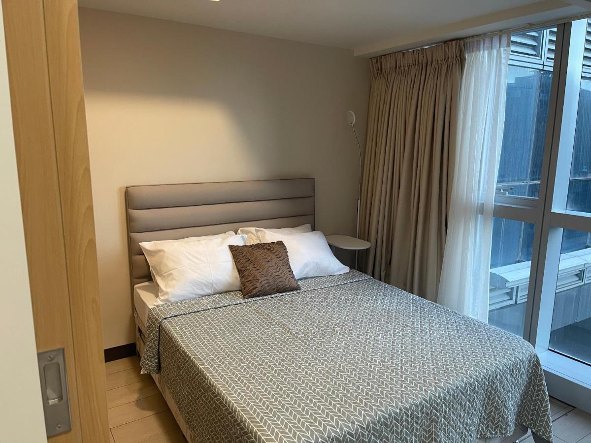 1 Bedroom Condo Uptown Parksuites Bgc, High Floor, Morning Sun Манила Екстериор снимка